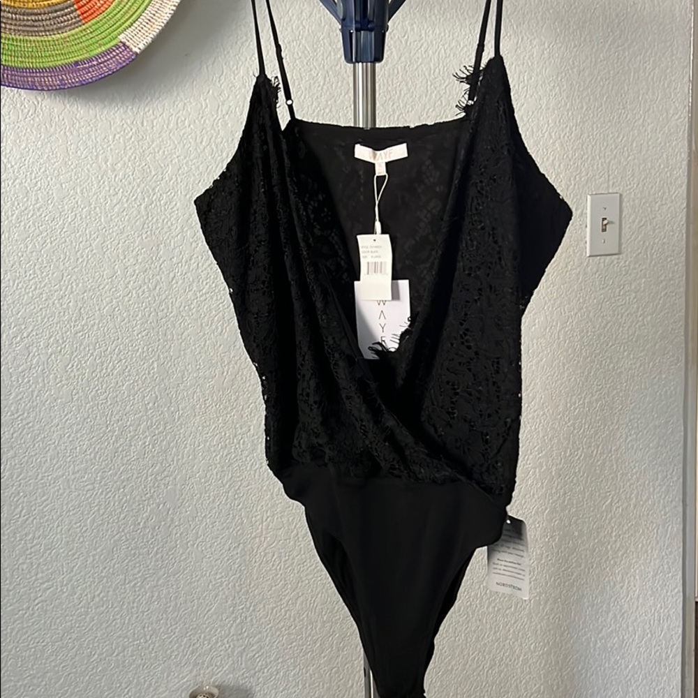 Black lace bodysuit with snap closure